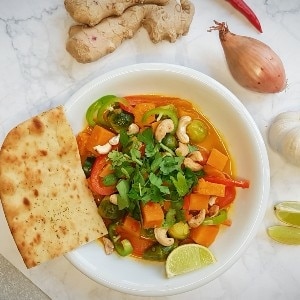 Korma curry met spruiten en zoete aardappel