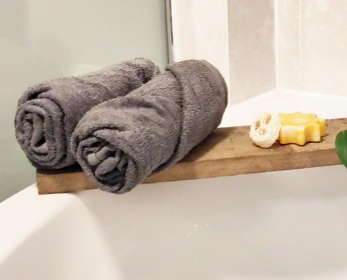 Maak rolletjes van je bestaande handdoeken spa badkamer duurzaam