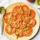 tomatencarpaccio met kruidige salsa
