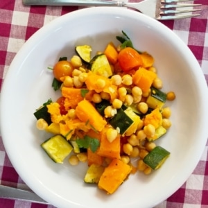 Recept Traybake met pompoen, courgette en kikkererwten